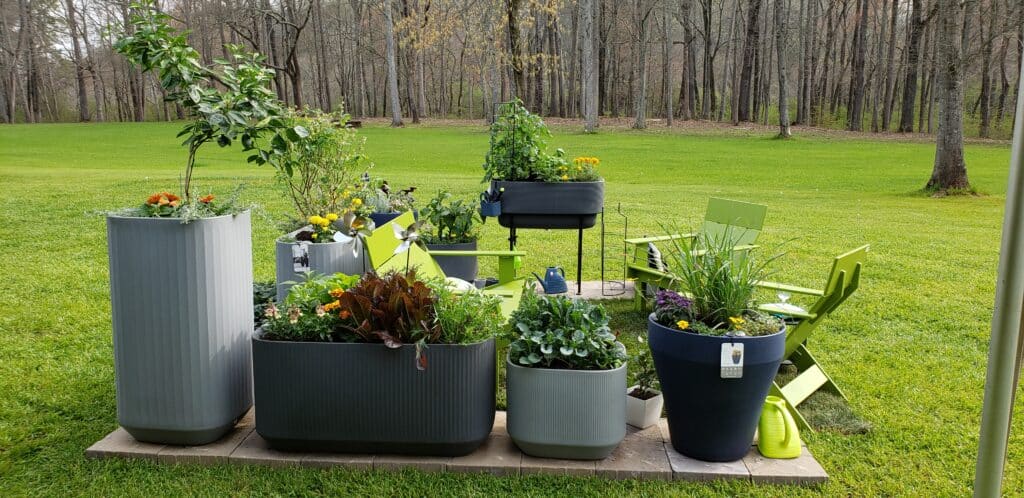 Backyard patio with various Crescent Garden planters